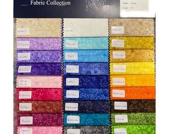 May include: A fabric swatch card with 24 different colors of cotton fabric. Each swatch has a small floral pattern and a name written below it. The names include: Nory, White, Beige, Orchid, Aldua, Ant Gold, Lilac, Sky, Camel, Riche, Delph, Lemon, Pale Pink, Navy, Sunshine, Fuschia, Royal, Orange, Rose, Midnight, Chocolate, Burg, Peacock, Olive, Deep Pink, Grey, Emerald, Red, Jet Black, and Bottle.