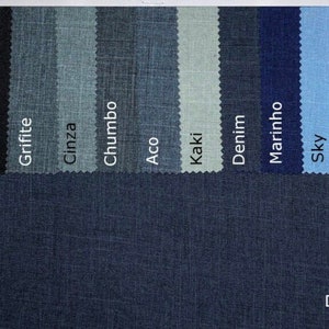 May include: A fabric swatch card showing ten different denim colors, including black, gray, blue, and light blue. The colors are labeled in Portuguese. The card is labeled "Denim" at the bottom.