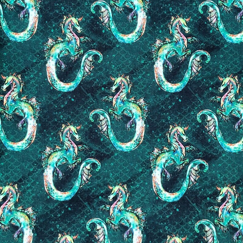 May include: A teal blue fabric with a repeating pattern of iridescent seahorses. The seahorses are facing right and have a light blue, green, and purple color scheme.