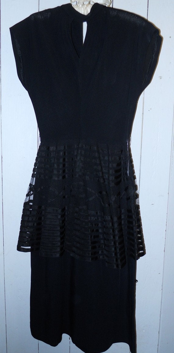 1940's black dress with net and ribbon peplum. PER