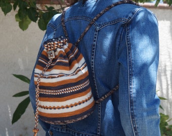 Colorwork Crochet Bag Pattern made with Koigu merino wool yarn.  Requires intermediate skill level.  Uses 4 skeins of yarn.B