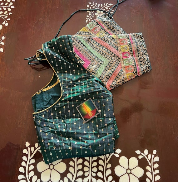Designer ready made blouse with chamki work on the hands all over. Light weight blouse. Size 36-44 inches chest