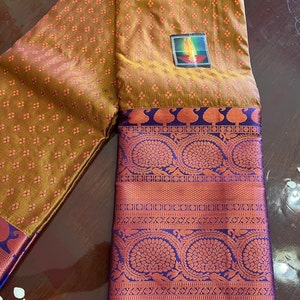 Pure kanchi Pattu saree with matching blouse piece attached . Gifting saree, copper zari weaving saree