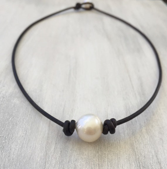 teen getting pearl necklace Teen getting pearl necklace