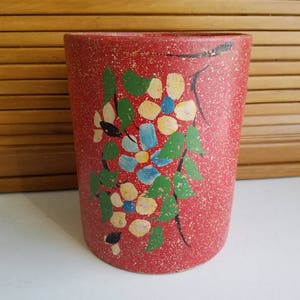 Ransburg Crockery Jar. Red with white spatter and hand painted flowers, cookie jar, stoneware canister
