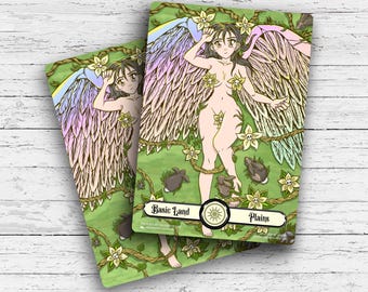 May include: Two trading cards featuring a nude woman with large feathered wings, surrounded by flowers and rabbits. The cards have a green background with the text "Basic Land" and "Plains". The woman has long dark hair and is adorned with flowers.