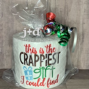 Questo è il regalo più schifoso che abbia mai trovato: carta igienica ricamata. Difficile da acquistare, regalo scherzoso. Regalo elefante bianco. Scambio di regali per le feste.