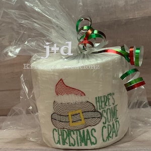 Ecco un po' di roba natalizia Carta igienica ricamata. Cacca di Babbo Natale. Regalo scherzoso difficile da acquistare. Regalo dell'elefante bianco. Scambio di regali per le feste.