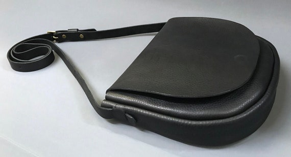 black leather saddle bag