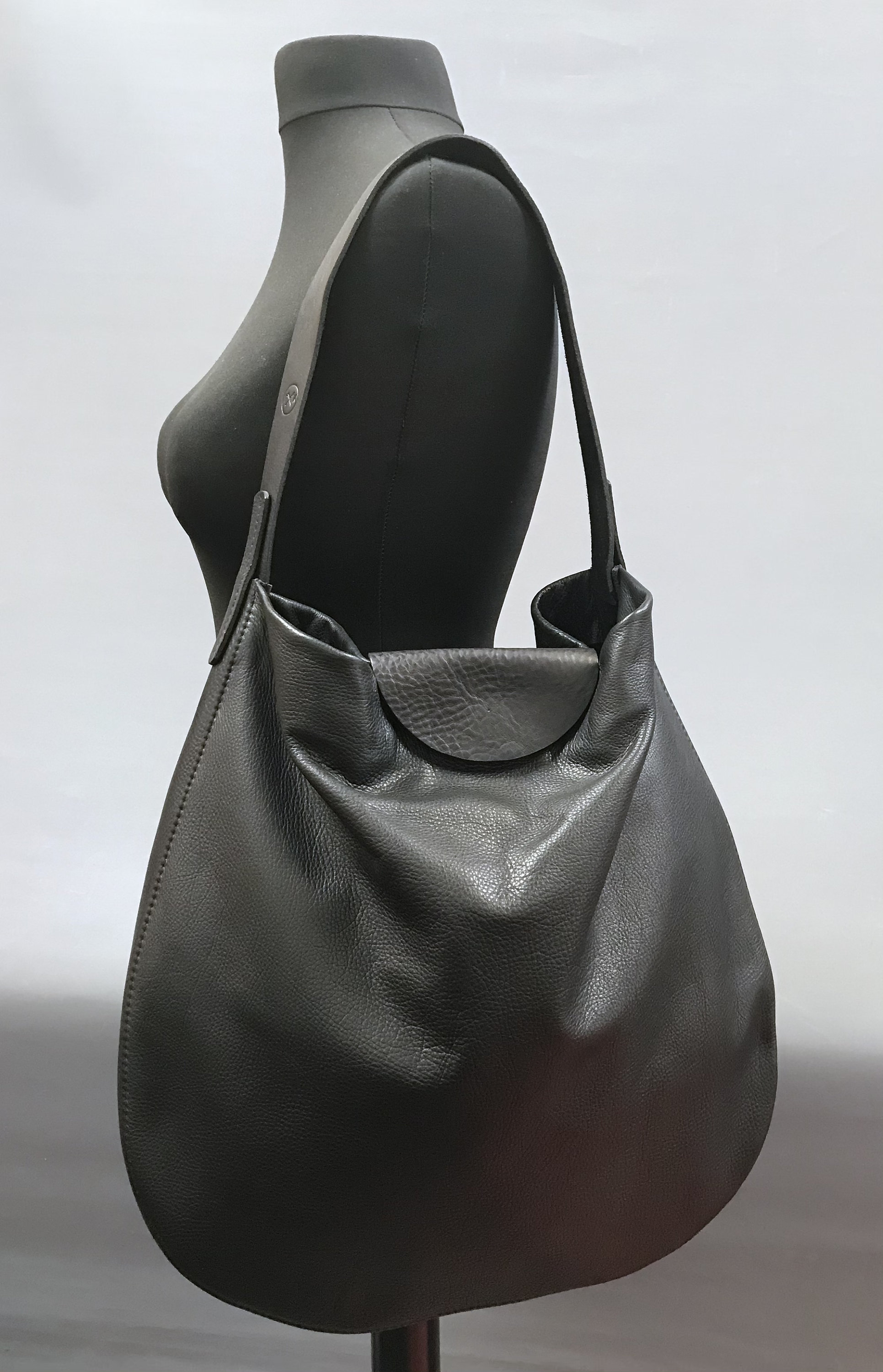large black handbag with shoulder strap
