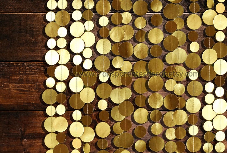 Gold Backdrop made with a set of 15x5 ft. long strings. (In person they are longer than the part that is pictured.)