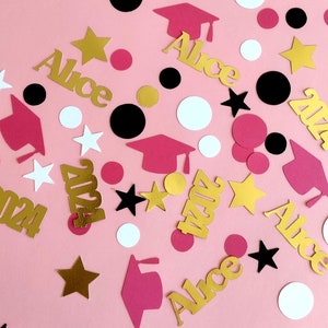 Hot pink graduation cap confetti.