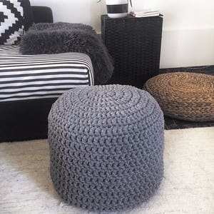 16 in x 16 in stone grey knitted pouffe. Great for living room as a footstool and/or side table.