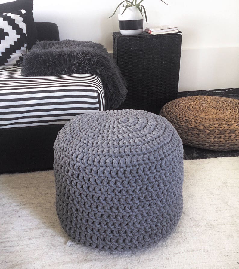 16 in x 16 in stone grey knitted pouffe. Great for living room as a footstool and/or side table.