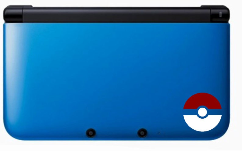 May include: A blue Nintendo 3DS handheld gaming console with a red and white Pokeball sticker on the back.