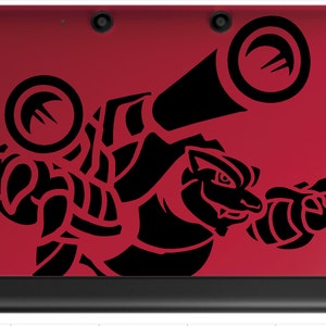 May include: A red Nintendo 3DS handheld gaming console with a black and white sticker of a Pokemon character on the top cover. The character is a large, muscular, humanoid creature with a large head and a long, pointed snout. The character is holding a large, cylindrical weapon in its right hand.