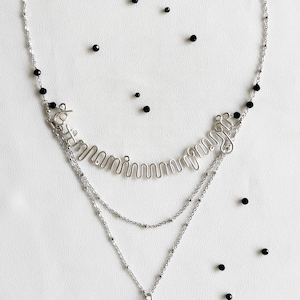 Namnhalsband i javanesisk skrift med svart onyxhänge / Personligt halsband i sterlingsilver