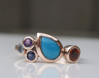 Multistone birthstone ring in recycled rose gold