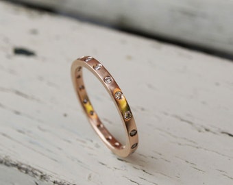 Recycled rose gold diamond eternity ring