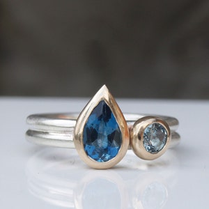 Blue topaz and aquamarine ring in gold and silver image 1