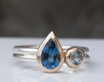 Blue topaz and aquamarine ring in gold and silver