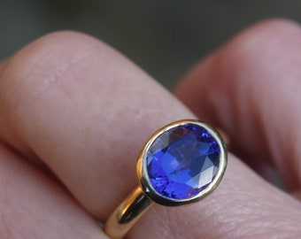 Large tanzanite ring in recycled 18ct yellow gold
