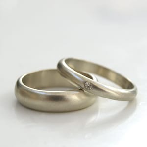 Recycled 9ct white gold wedding ring set with diamonds