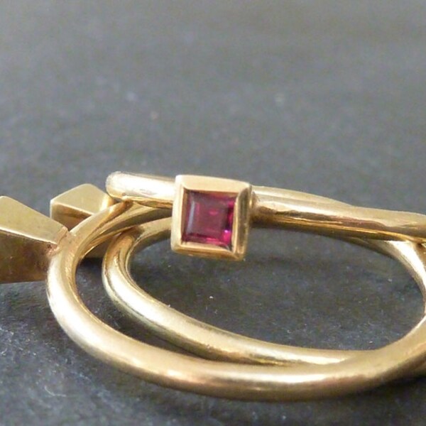 18ct recycled yellow gold ring with square cut ruby, July birthstone.