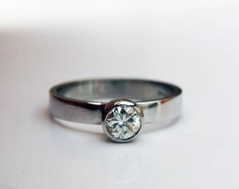 Platinum Forever One half carat moissanite engagement ring