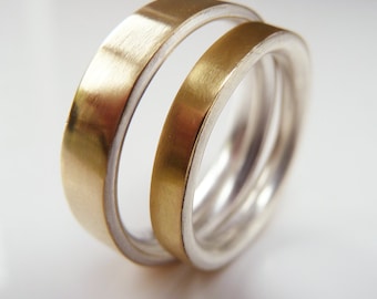 Wedding ring set, silver and 18ct yellow gold matching wedding rings