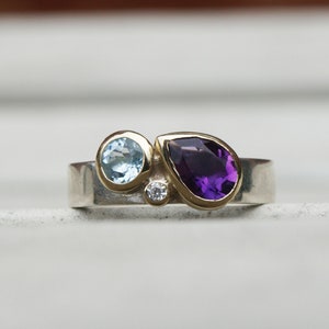 Birthstone ring with amethyst, aquamarine and diamond