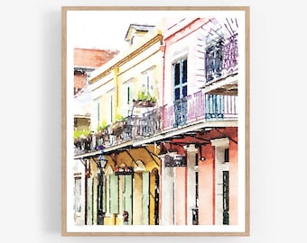 May include: Watercolor painting of colorful buildings with balconies in New Orleans. The buildings are painted in shades of yellow, pink, and blue. The balconies have wrought iron railings and are decorated with plants.