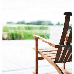 May include: A wooden rocking chair with a light brown frame and dark brown backrest. The chair is on a white surface, with a blurred green landscape in the background. The image has a watercolour effect.