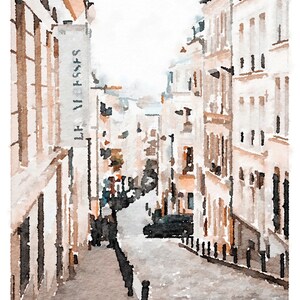 Paris Art Prints Digital Download Wall Art Set of 3, Paris Photography, Neutral Art, Paris Wall Decor, France Buildings Streets Watercolor A watercolor painting of a narrow street in a city. The street is lined with tall buildings, and the buildings are painted in shades of beige and white. The street is paved with cobblestones, and there are a few cars parked on the side of the street. The sky is a light blue color, and there are a few clouds in the sky.