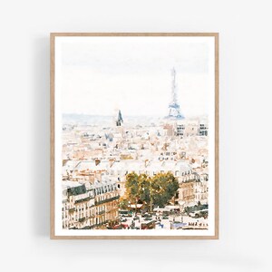 May include: A watercolor painting of the Paris skyline with the Eiffel Tower in the distance. The painting is done in soft, muted colors and features a variety of buildings and trees.