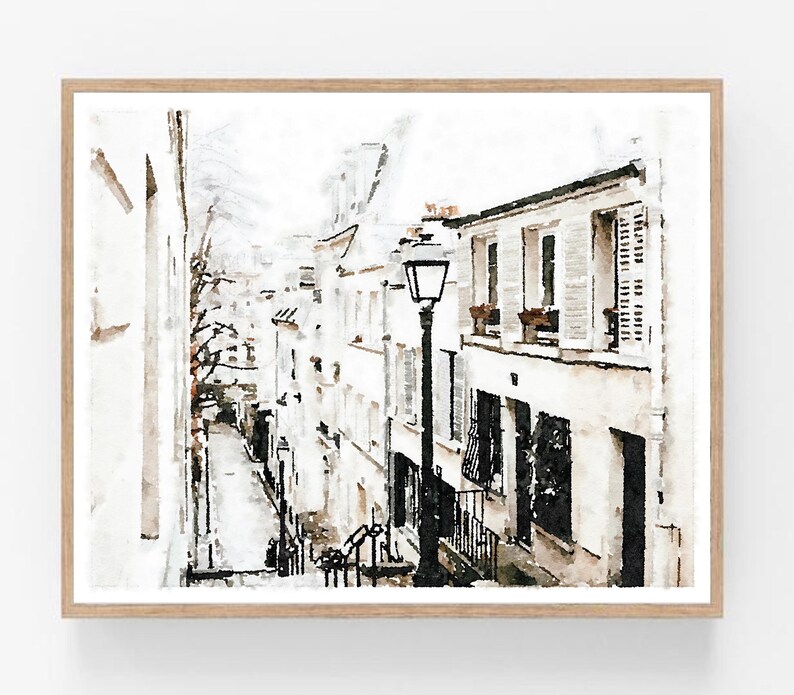 Parisian Decor Paris France Print Digital Download, Black White French Poster, Architecture Street Buildings 5x7, 8x10, 11x14, 16x20, 18x24. A watercolor painting of a narrow street in a city. The street is lined with buildings on both sides, and there is a lamppost in the center of the street. The buildings are painted in shades of white and gray, and the street is painted in shades of gray and brown.
