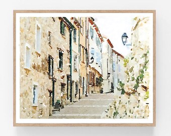 May include: A watercolor painting of a narrow street in a European city. The buildings are painted in shades of beige, brown, and white, with some windows and doors painted in blue. The street is lined with steps leading up to the top of the hill. The painting has a soft, dreamy feel.