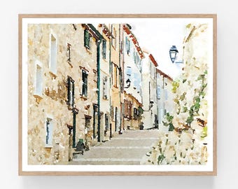 May include: A watercolor painting of a narrow street in a European city. The buildings are painted in shades of beige, brown, and white, with some windows and doors painted in blue. The street is lined with steps leading up to the top of the hill. The painting has a soft, dreamy feel.