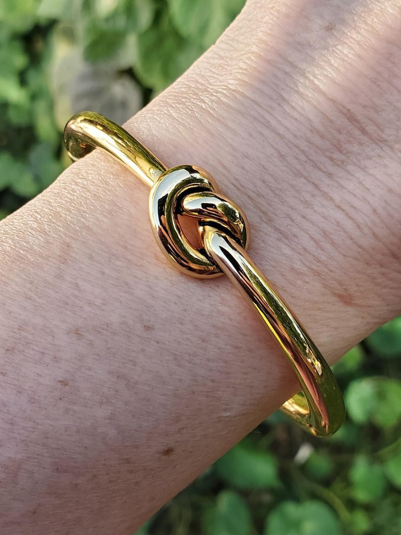 NEW Brighton Interlok Single Knot Gold Hinged Bangle afbeelding 1