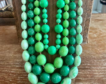 Set of four vintage 1960s-80s chunky green resin lucite plastic long bead necklaces, fun fabulous collection!