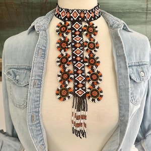 Vintage monumental beaded bib runway necklace orange black white glass beads, adjustable beaded button choker closure, great condition