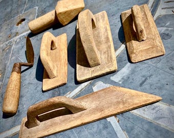 A rare and intriguing set of tiny antique bricklaying mason tools industrial sculptures great patina