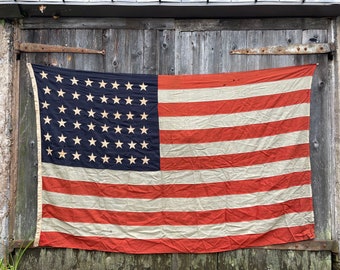 Large Antique American flag 48 star wool  with sewn Stars and Stripes great fade and patina 5x8