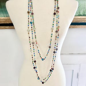 Three strands of authentic vintage 1920s-era colorful glass bead long flapper necklaces. Your choice!