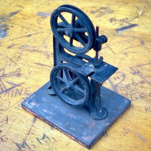 19th century industrial steel model shop saw beautifully built sculpture.