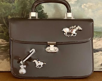 Vintage 1950s brown patent leather purse with vintage horse racing brooches sterling silver Kentucky Derby triple crown Belmont Preakness