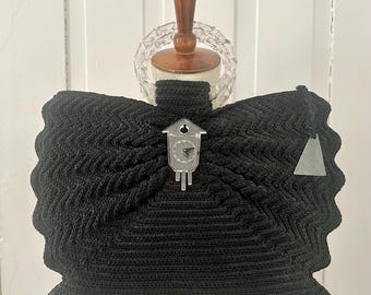 Vintage one-of-a kind 1940s large black corde purse adorned with with rare lucite articulated clock brooch with moving hands. Stunning!