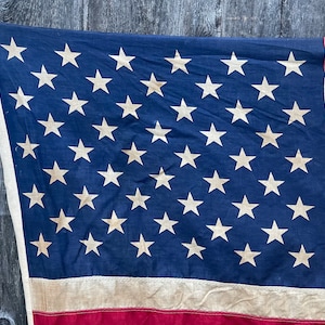 Weathered Vintage American flag 1960 cotton 5’ x 3’  great fade and patina worn flag