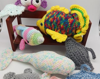 Under The Sea Stuffed Animals, purple pufferfish, rainbow dolphin, pastel beluga, bright tropical fish