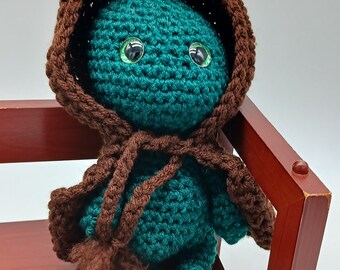 Crocheted Impkin, green forest sprite with brown cape